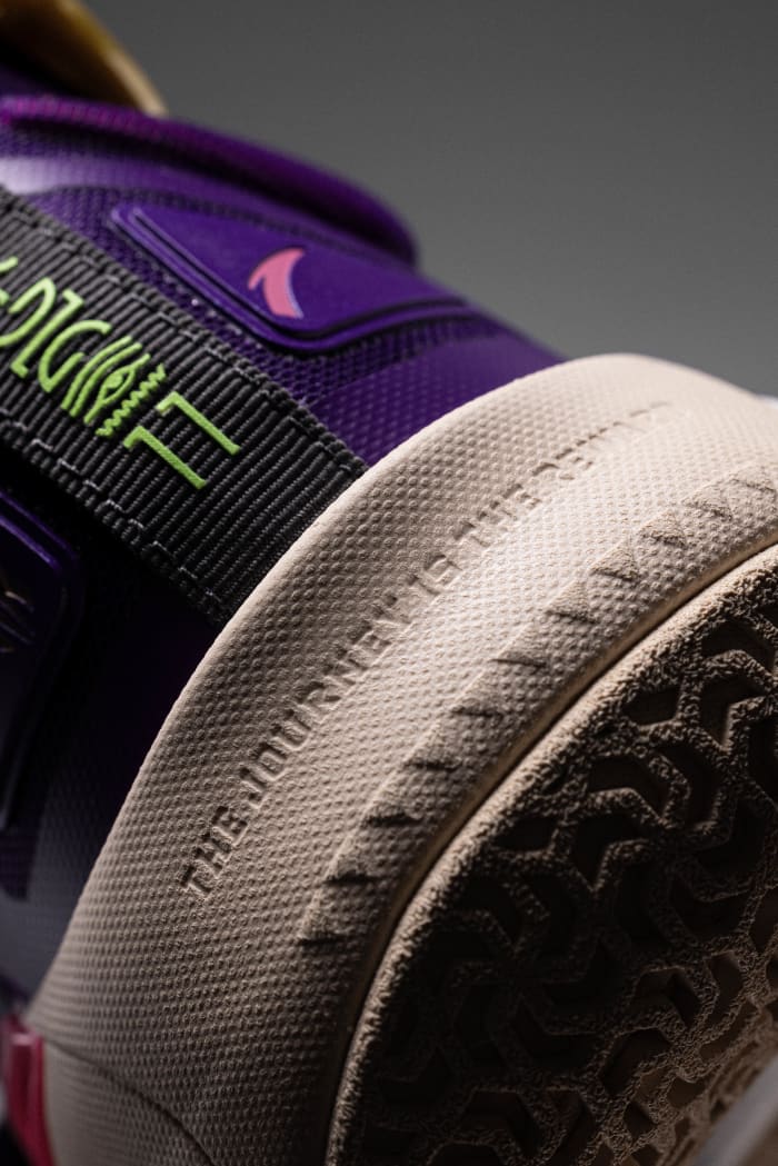 The heel of Kyrie Irving's purple and red ANTA shoe.